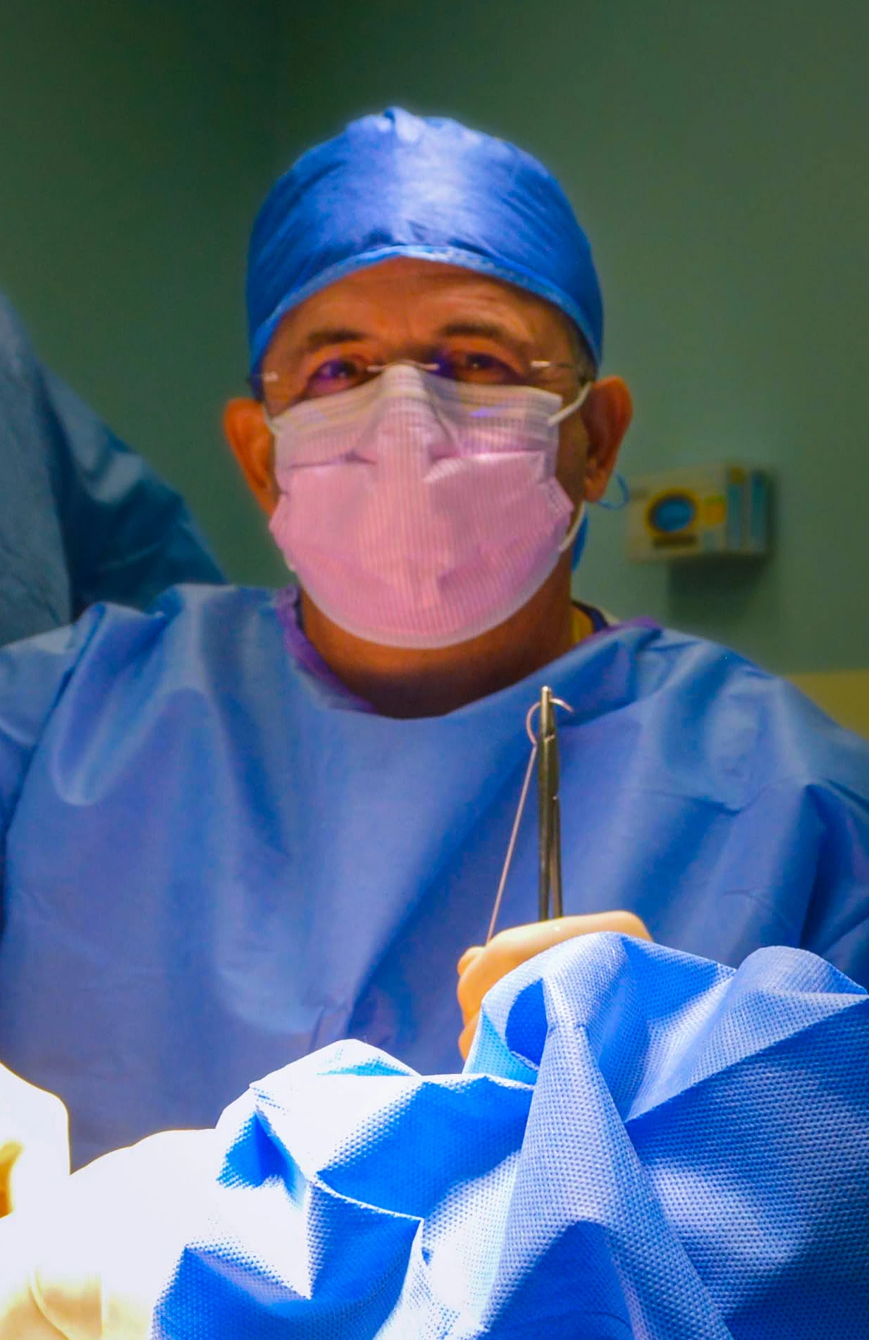 Dr Michel Bormey doing a surgery